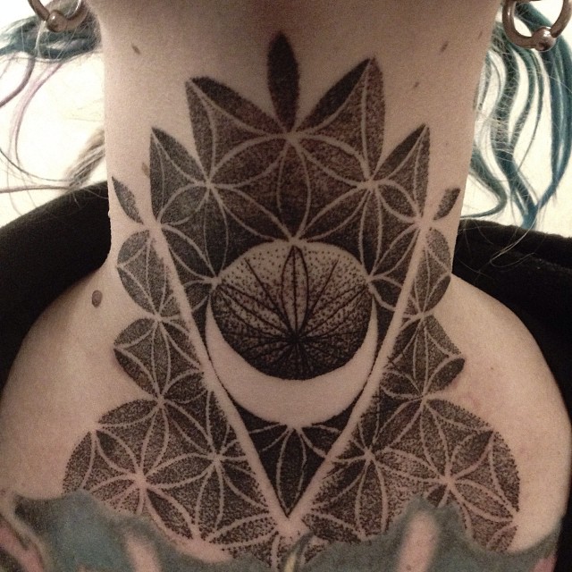 Sacred geometry pattern tattoo on the neck