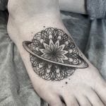 Saturn mandala tattoo