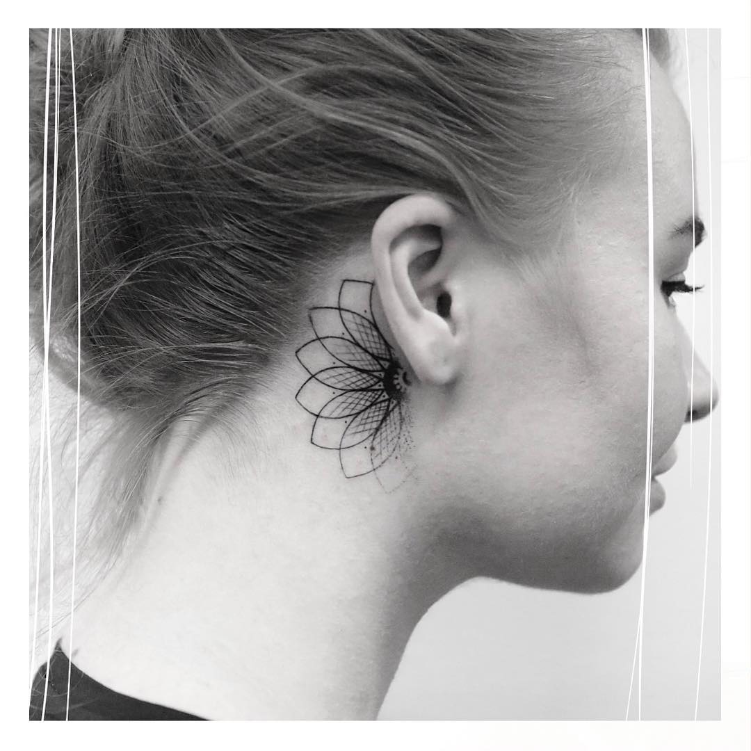 Seed of life behind the ear tattoo