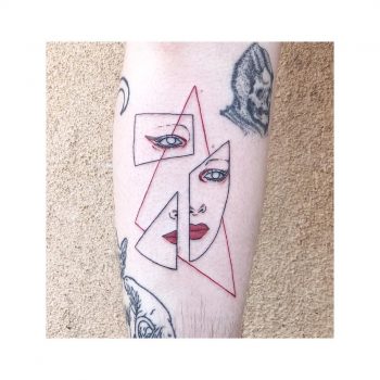 Shattered face tattoo