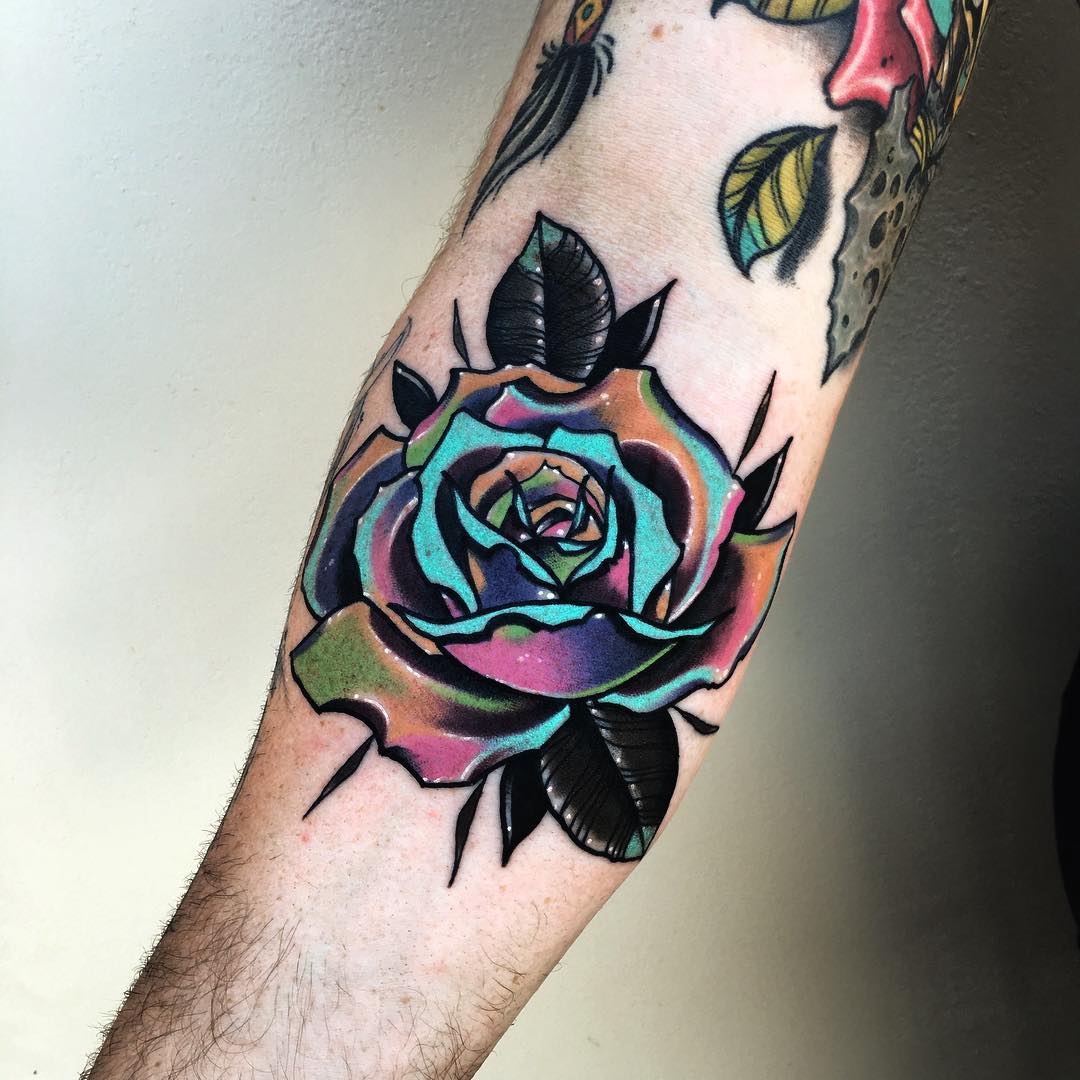 Shiny rose tattoo