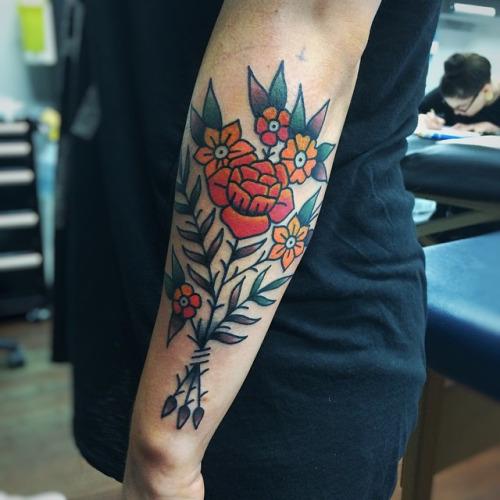 Simple traditional flower bundle tattoo