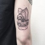 Skull and crystals tattoo