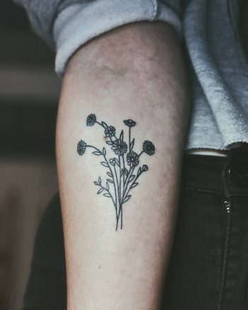 Small black flower bundle tattoo