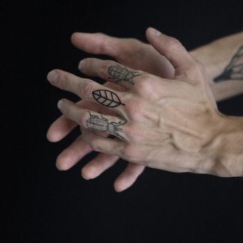 Small leaf tattoo on the finger