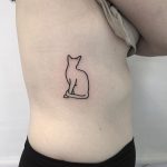 Small outline cat tattoo on the rib