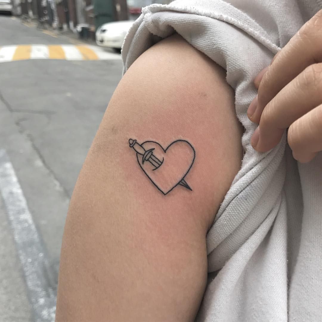 Stabbed outline heart tattoo