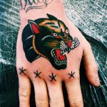 Superb traditional panther head tattoo