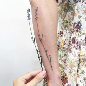 Superb wildflower forearm tattoo