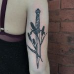 Sword and wheat stem tattoo
