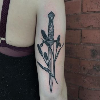 Sword and wheat stem tattoo