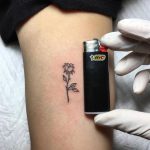 Tiny rose tattoo idea