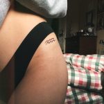 Tiny wave symbol tattoo