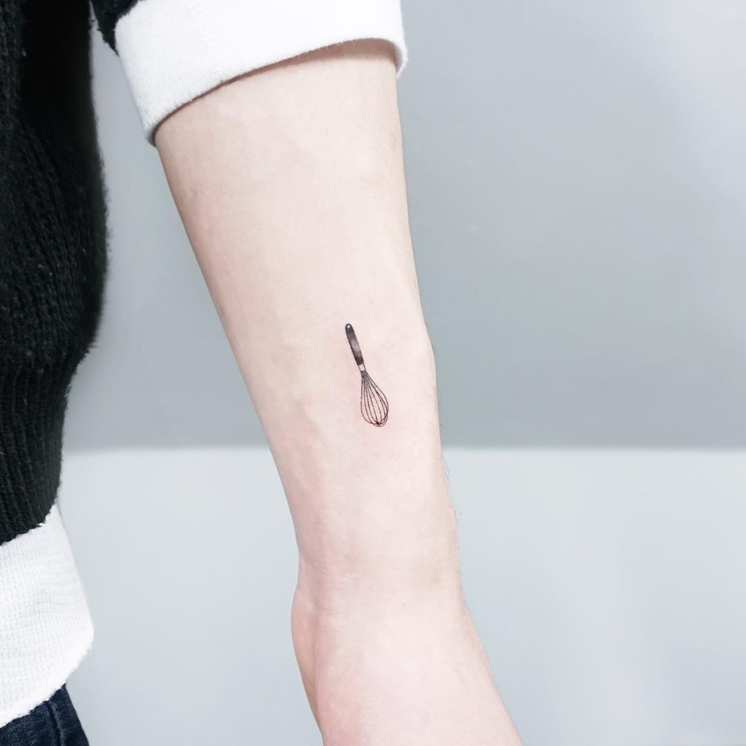 Tiny whisk tattoo