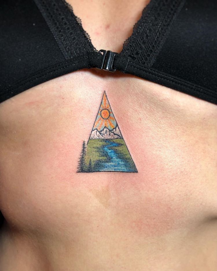 Triangular landscape sternum tattoo