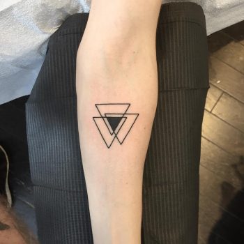 Triple triangle on the forearm