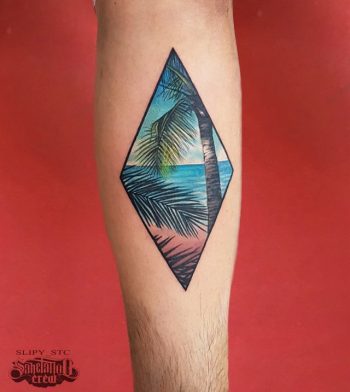 Tropical paradise tattoo in a rhombus