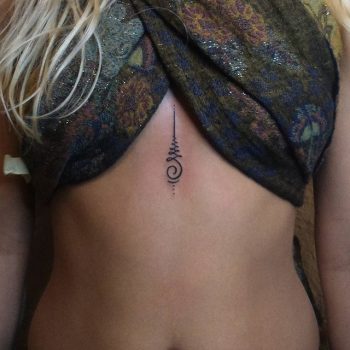 Unalome sternum tattoo