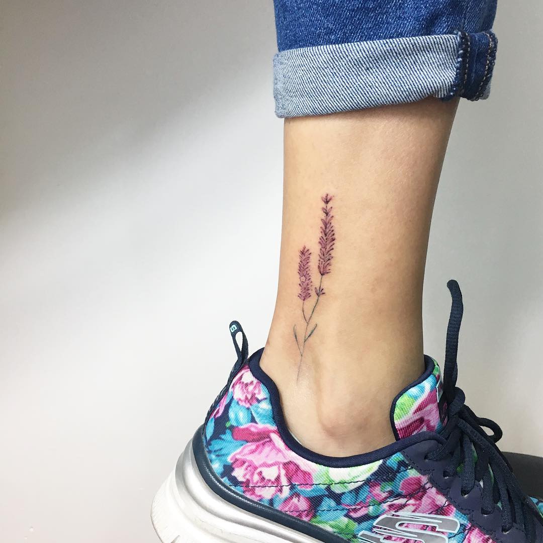 Violet flower ankle tattoo