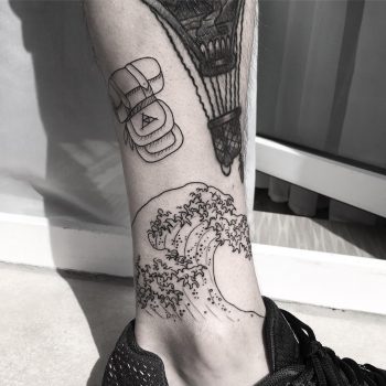 Wave tattoo on the ankle