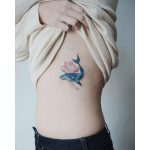 Whale and lotus flower tattoo
