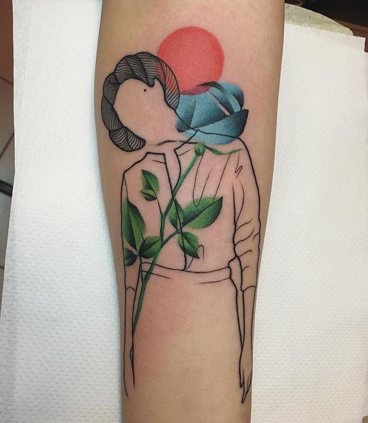 Woman silhouette and blue rose tattoo