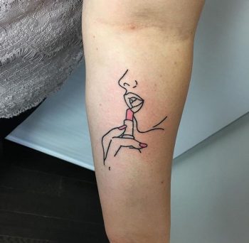 Woman with a lipstick tattoo