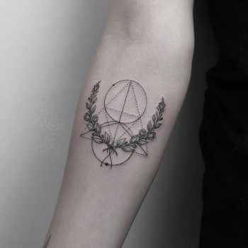 Wreath and geometric shapes tattoo