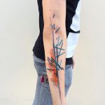 Abstract blue and orange tattoo