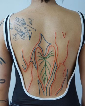 Abstract lines tattoo on the back