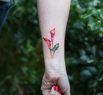 Abstract tattoo of colorful leaves