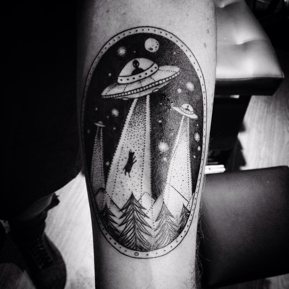 Alien abduction scenery tattoo