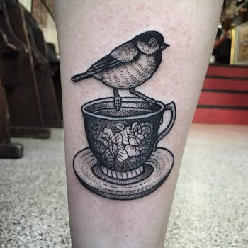 Bird on a cup tattoo
