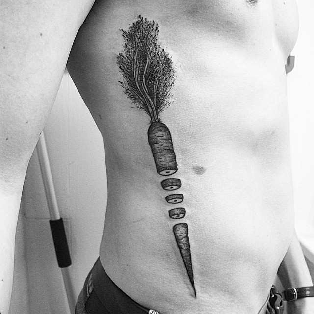 Black cut carrot tattoo - Tattoogrid.net
