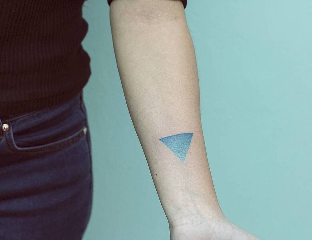 Blue gradient triangle tattoo
