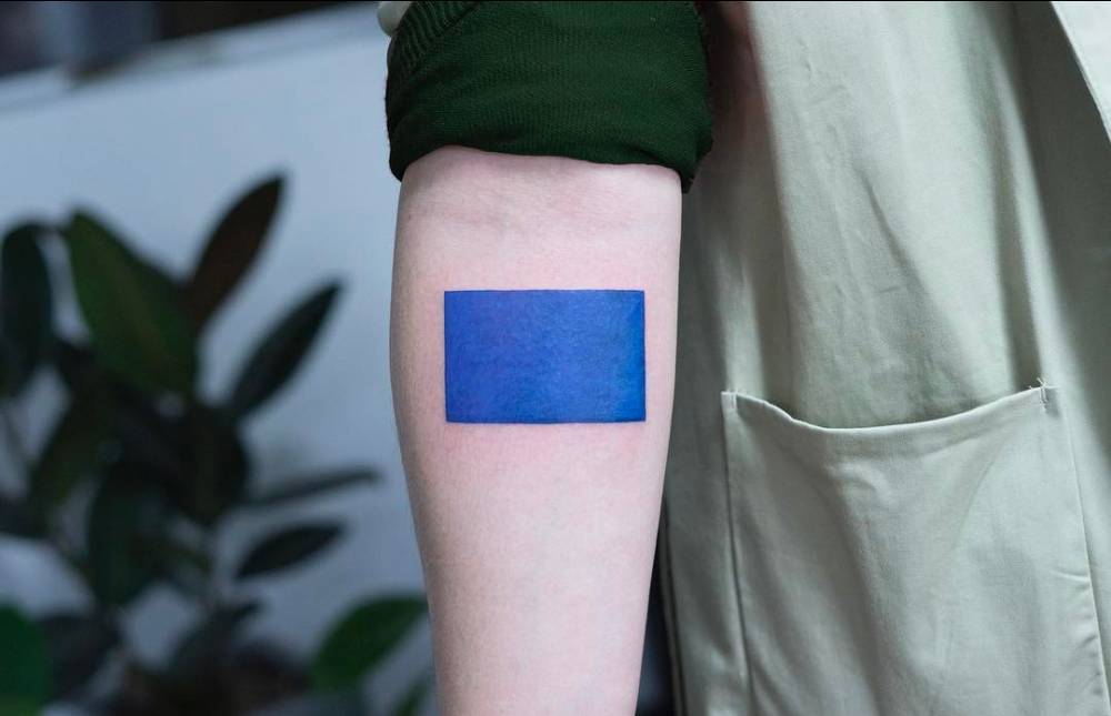 Blue rectangle tattoo