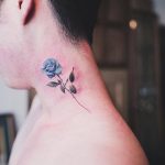 Blue rose tattoo on the neck
