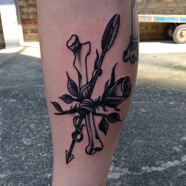 Bone arrow and rose tattoo