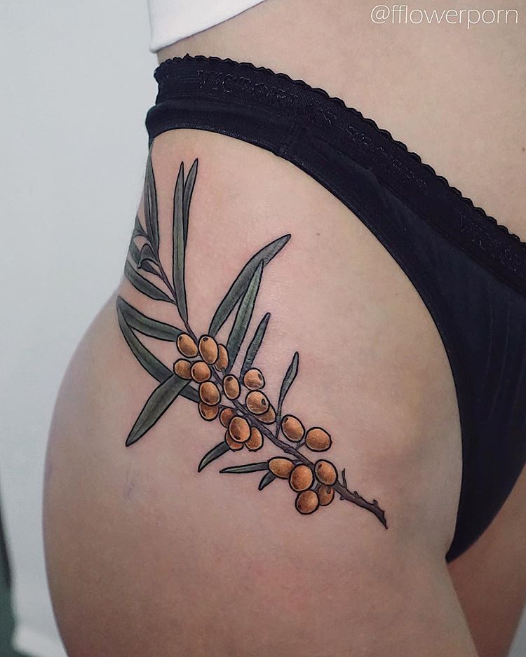 Branch with yellow berries tattoo