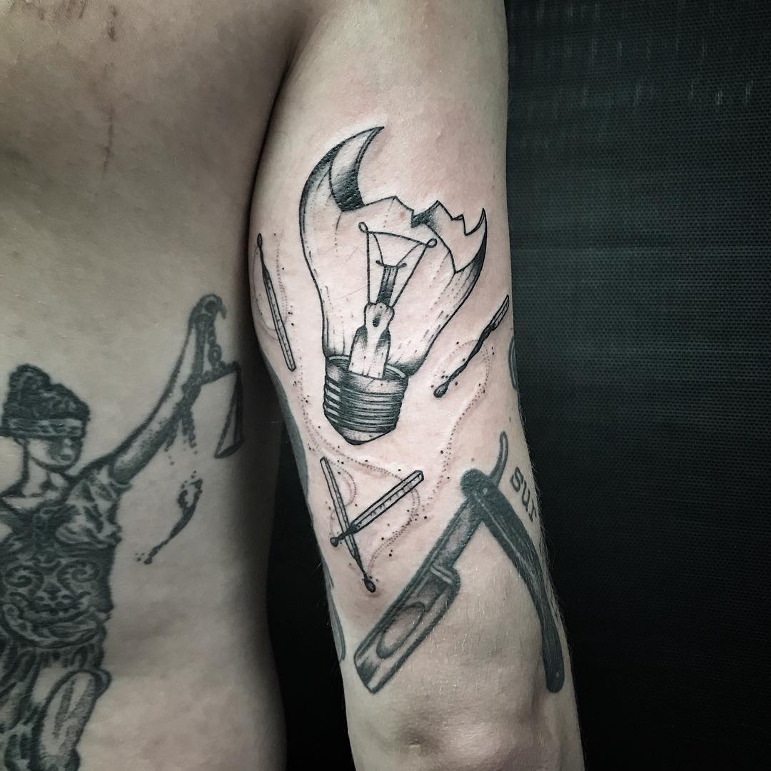 Broken lightbulb tattoo