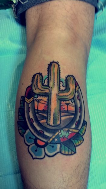 Cactus and horseshoe tattoo