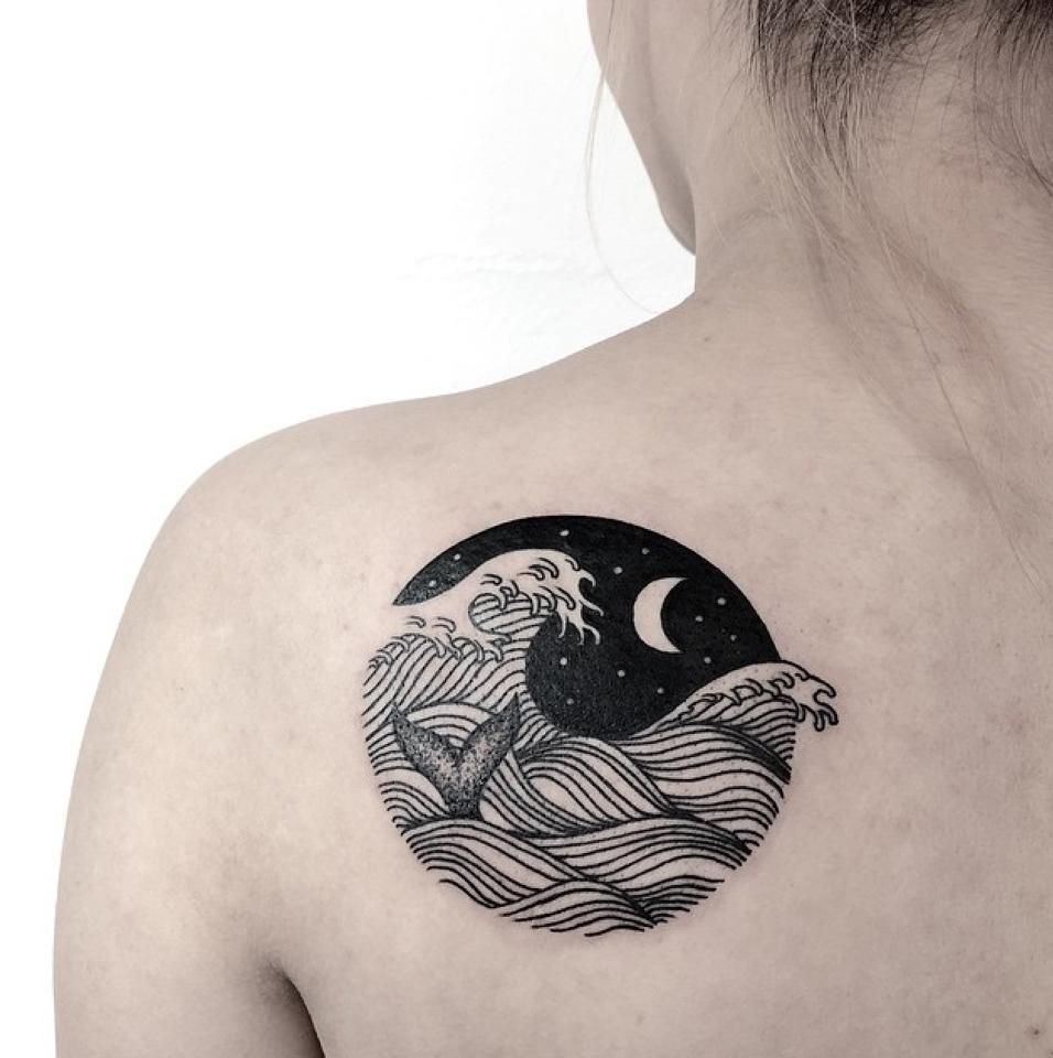 Circular waves moon and whale tattoo