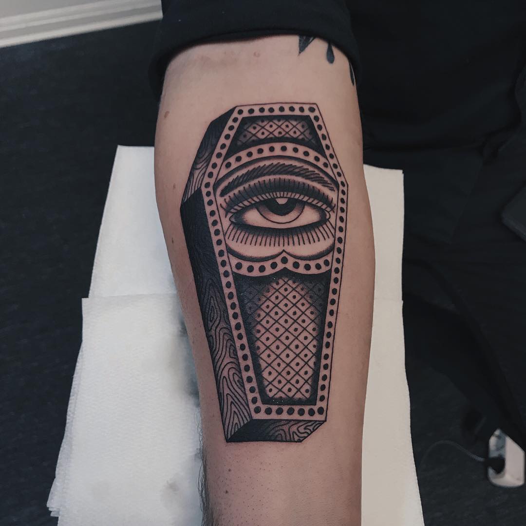 Coffin with an eye tattoo