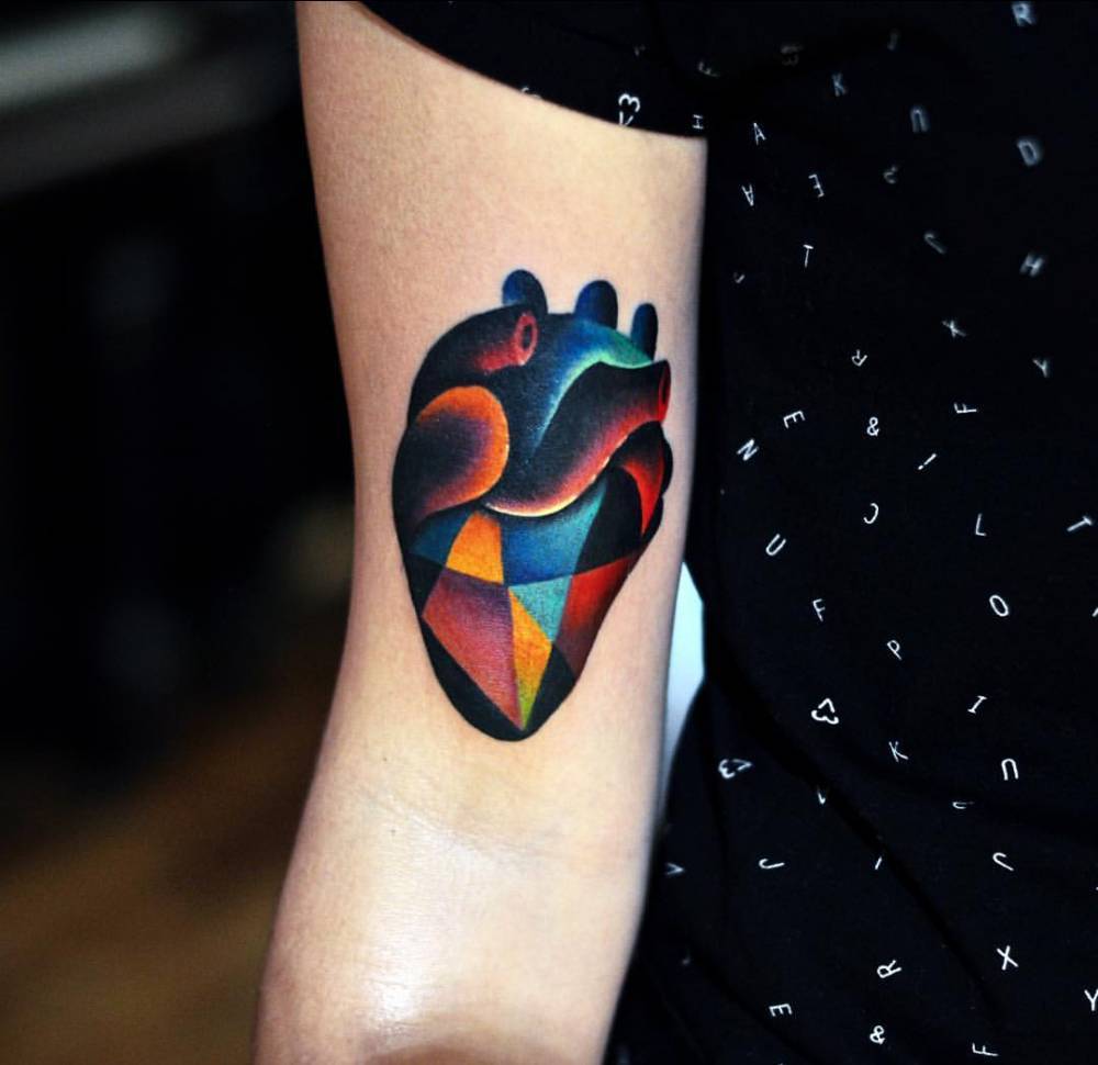 Colorful and geometric heart tattoo