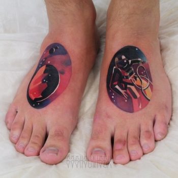 Colorful cosmic tattoos on both feet