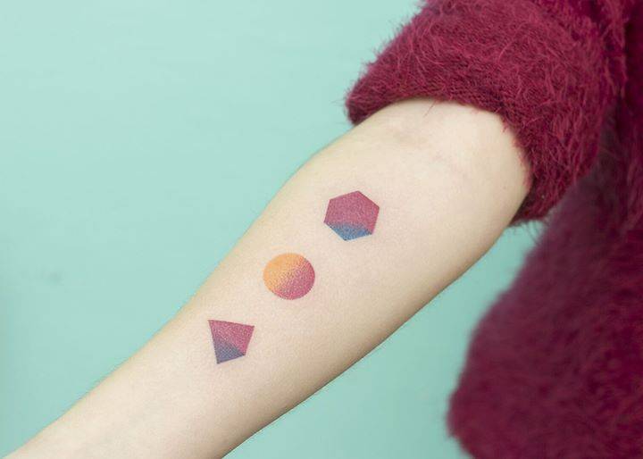 Colorful geometric shapes tattoo