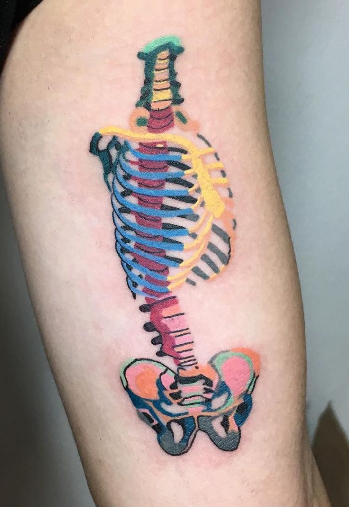 Colorful spine skeleton tattoo