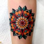 Colorful star and mandala tattoo