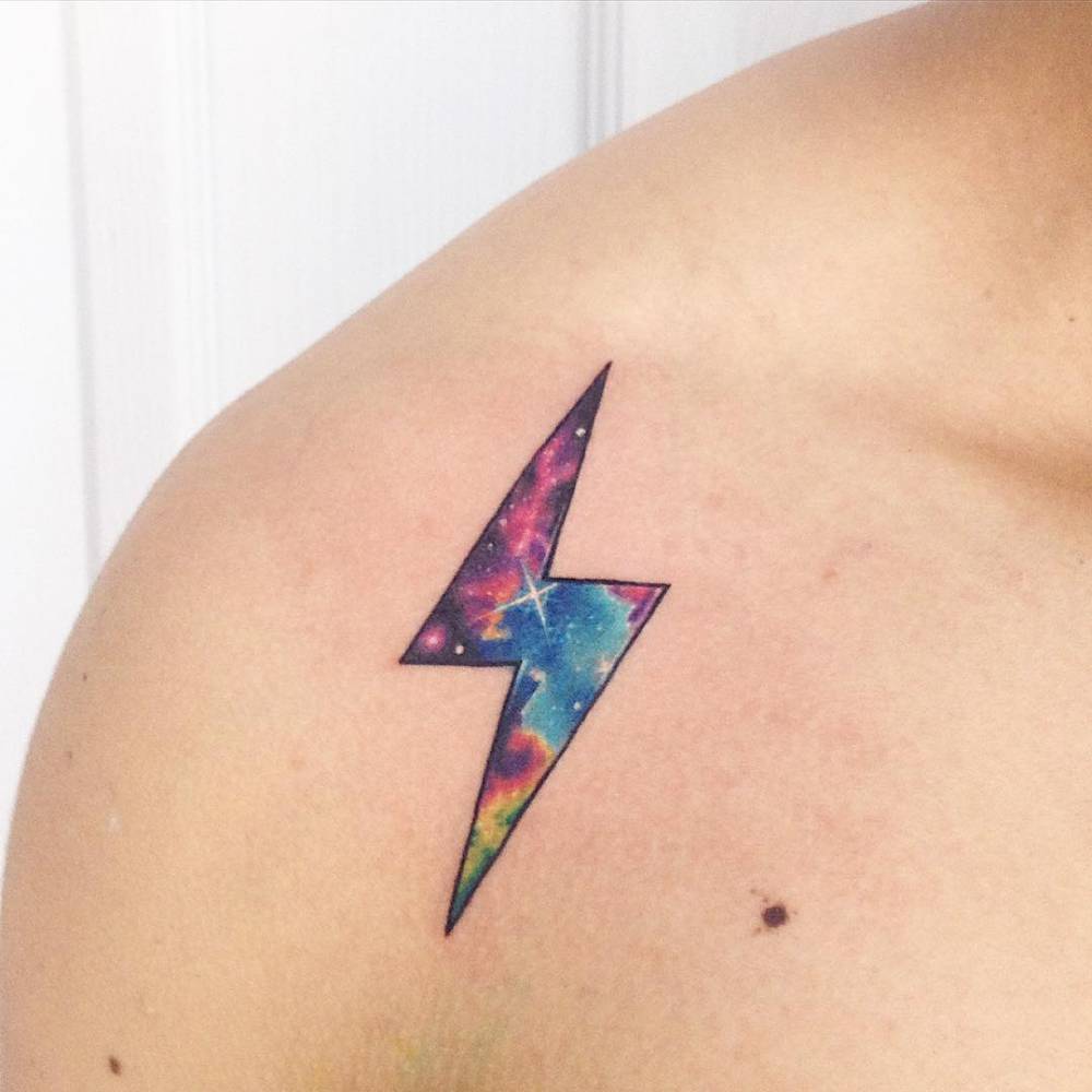 Cosmic lightning bolt tattoo