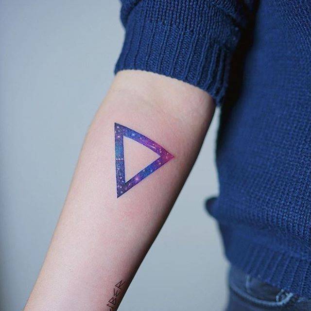 Cosmic triangle tattoo